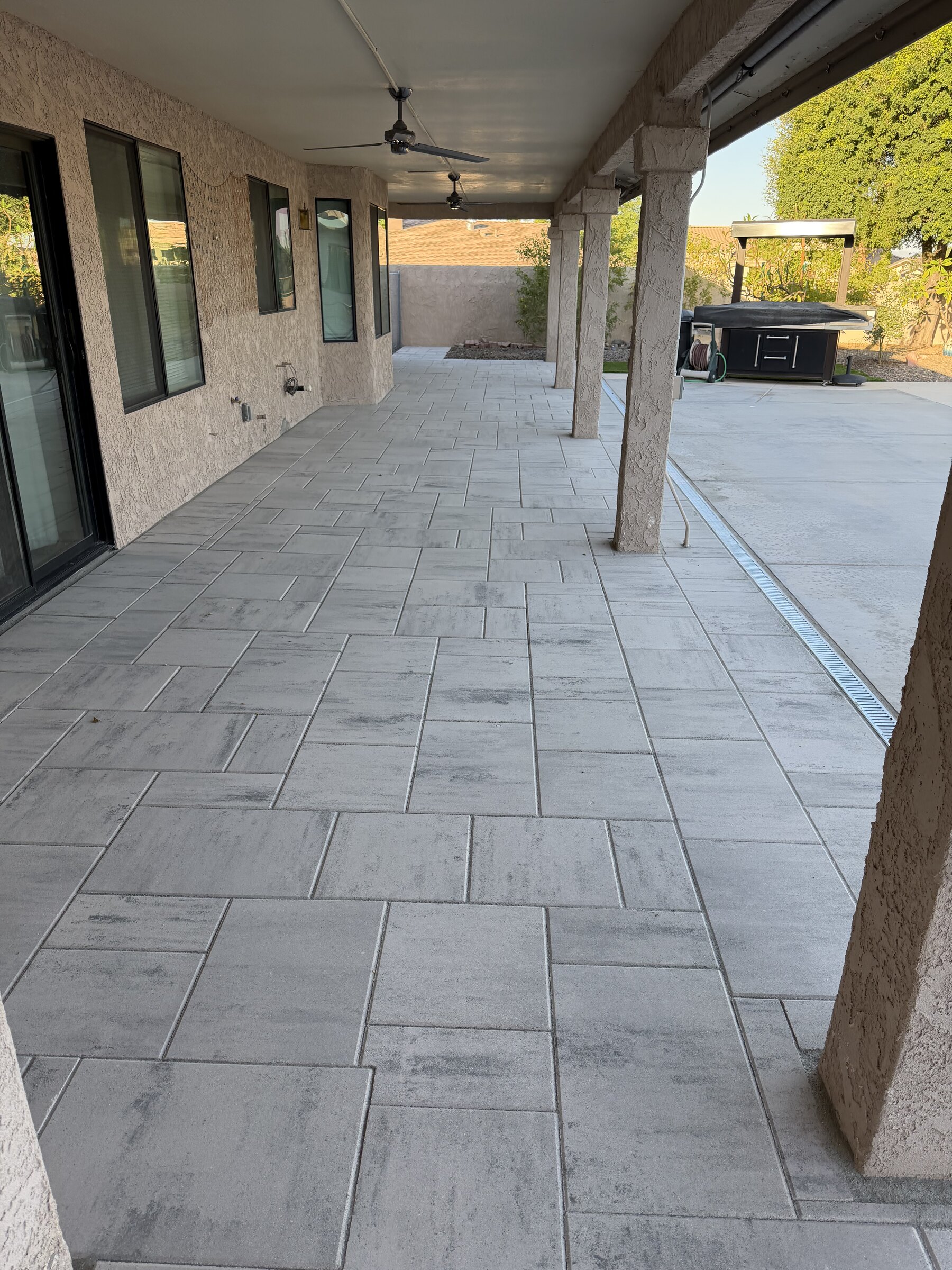 Grey Covered Patio & Drainage by Havasu Pavers in Lake Havasu City